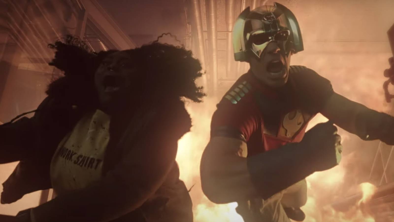 Peacemaker and Adebayo jump from an explosion in Peacemaker