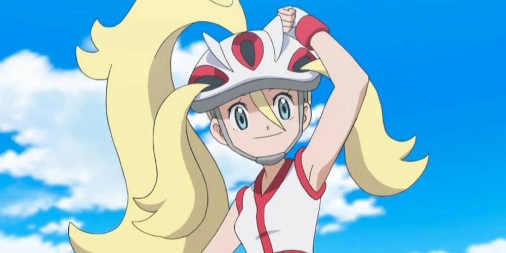 Pokemon anime Korrina smiling and adjusting her helmet