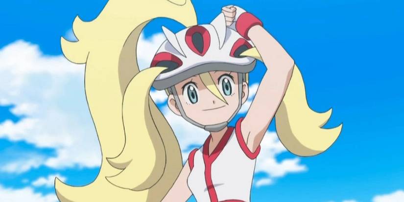 Pokemon anime Korrina smiling and adjusting her helmet
