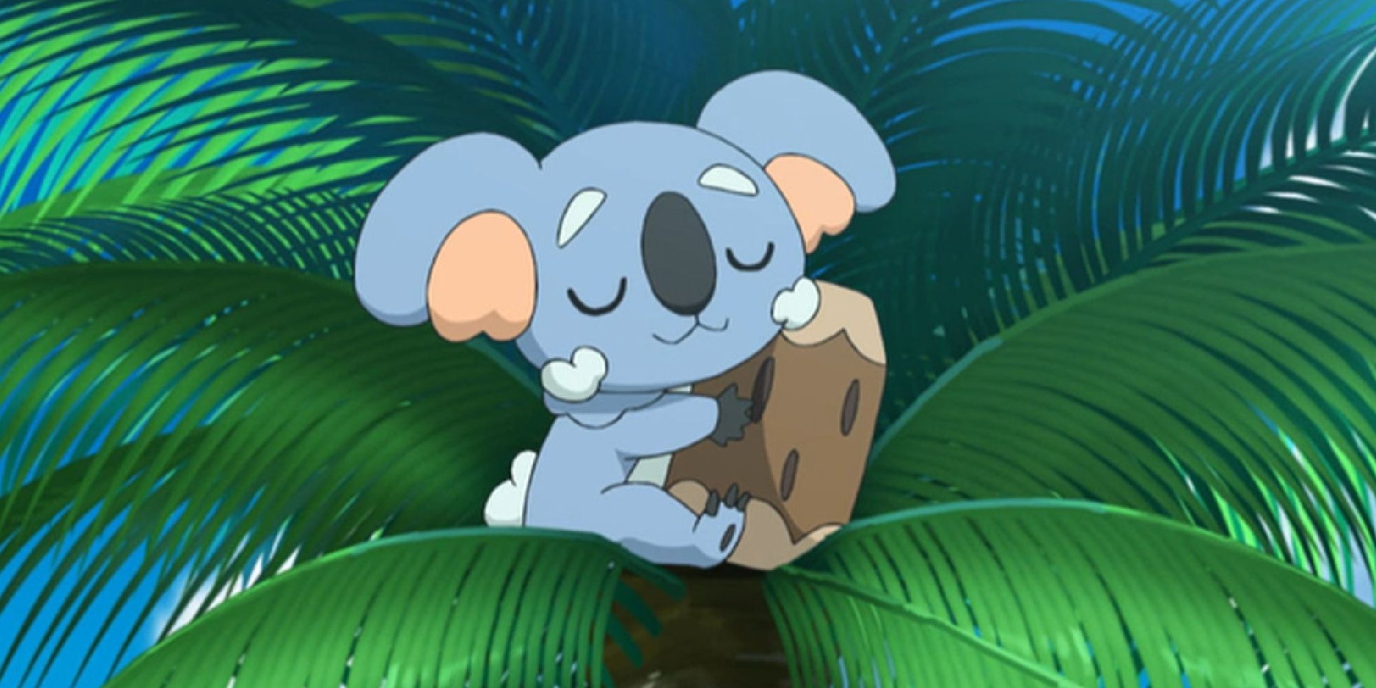 Komala appearing in the Pokemon anime, sitting in a tree sleeping