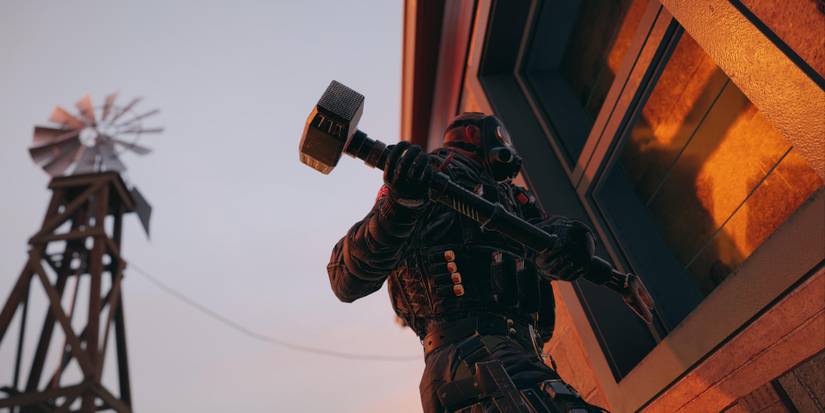 Popular Games on Steam - Tom Clancy's Rainbow Six Siege - Player about to smash window with weapon