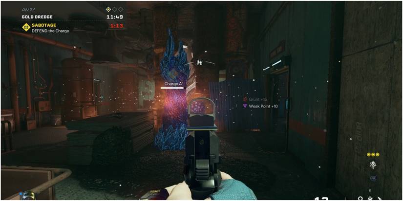 Rainbow Six Extraction Shooting A Breacher That Is Attacking A Charge