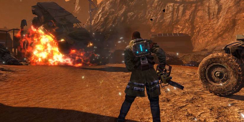 Protagonist Alec Mason fires a rocket launcher at an EDF vehicle, making it explode.