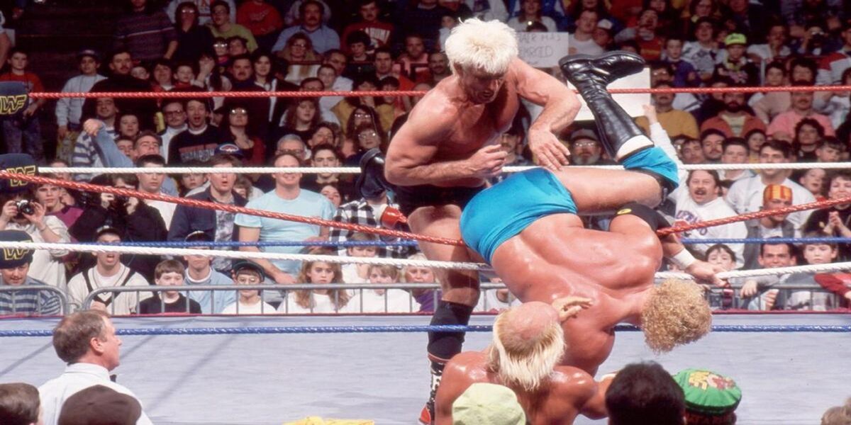 Ric Flair throwing someone out of the ring