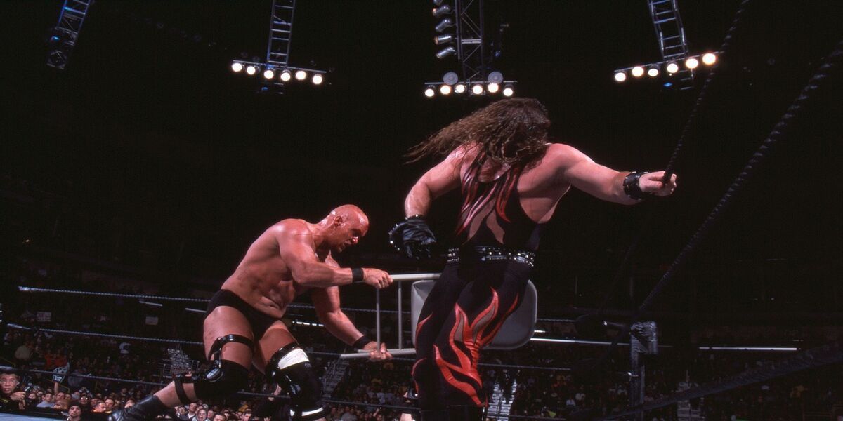 Kane and Austin fighting