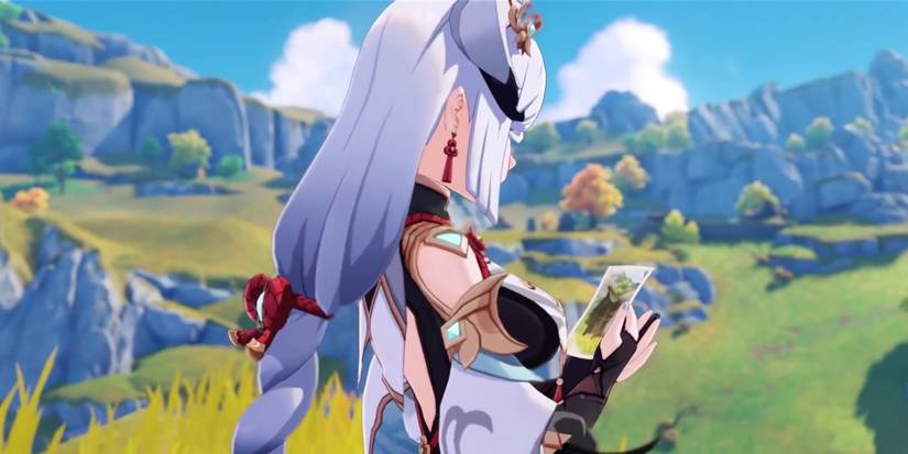 Shenhe looking into an image in Genshin Impact
