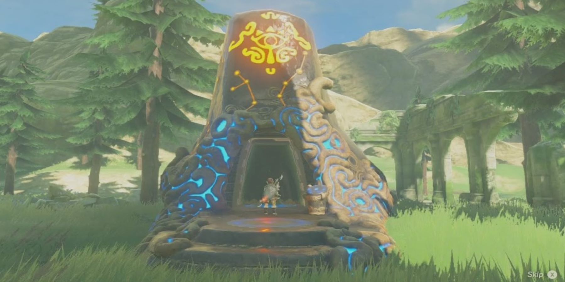 Линк стоит у входа в древнее святилище возле деревни Рито в The Legend of Zelda: Breath of the Wild.