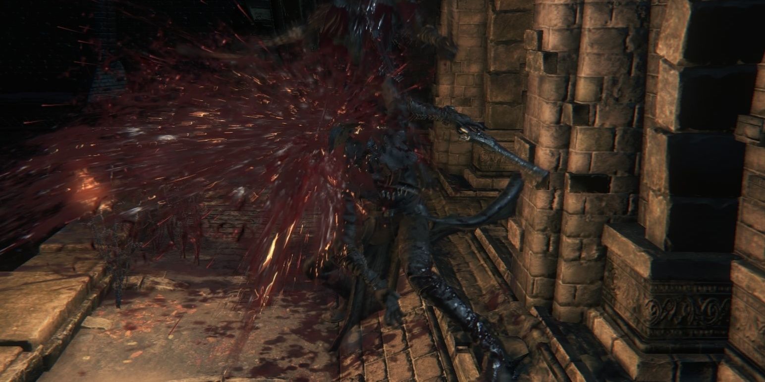 The hunter performing a Visceral Attack in Bloodborne