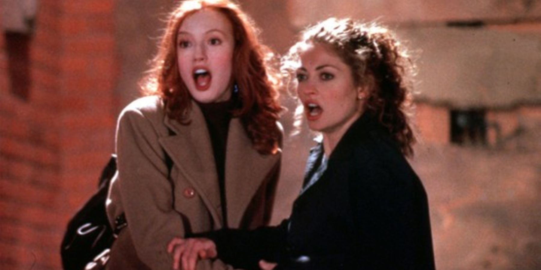 Alicia Witt as Natalie and Rebecca Gayheart as Brenda yelling in Urban Legend