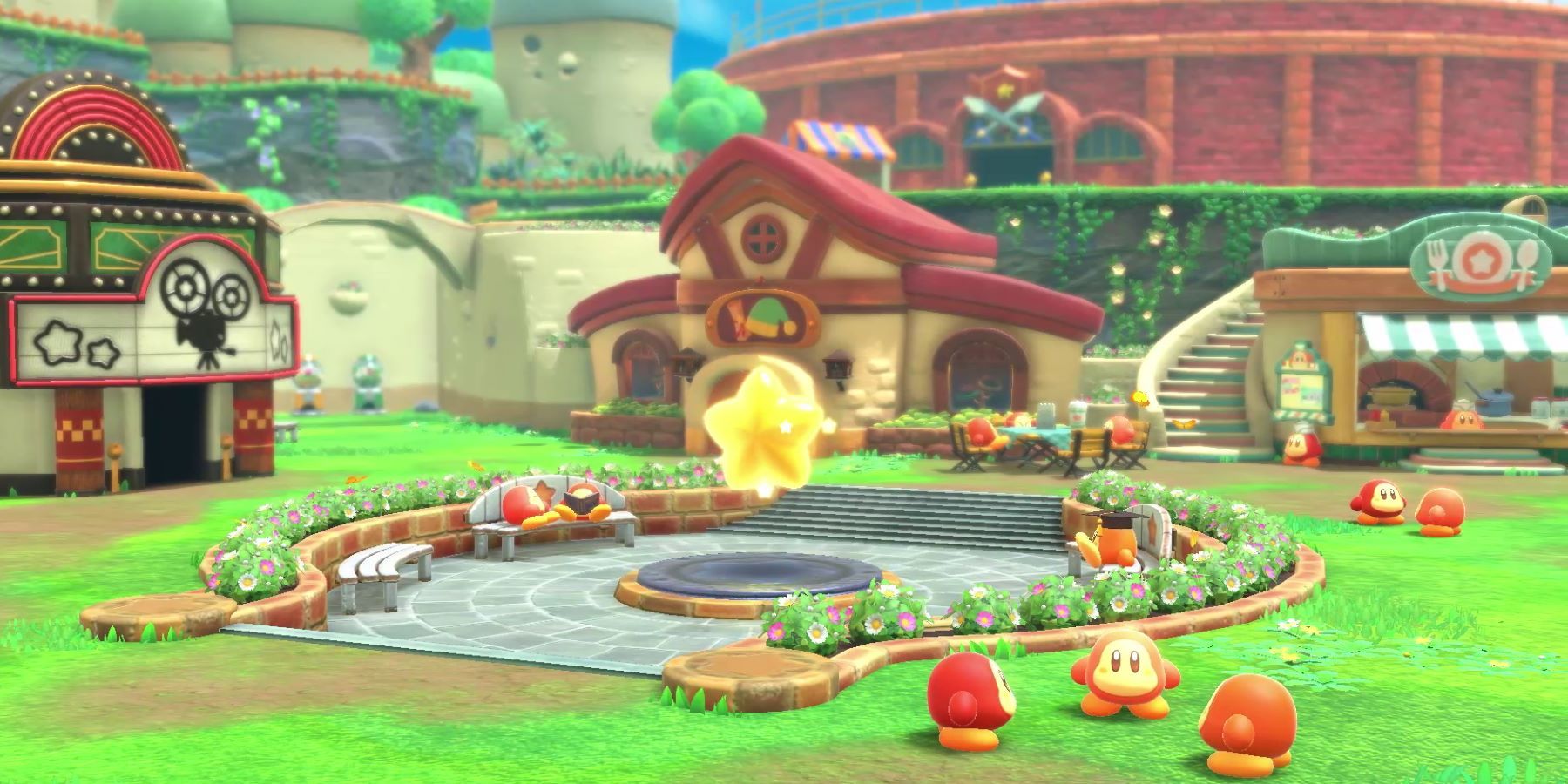Kirby and the Forgotten Land's Waddle Dee Town, with a movie theater, restaurant, battle arena, Warp Star, and many Waddle Dees visible
