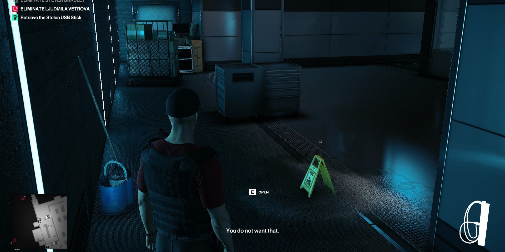 Agent 47 walks past a wet floor sign in the Maldives level of Hitman 2