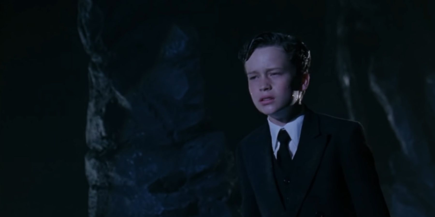 Young Bruce Wayne being scared of a giant bat
