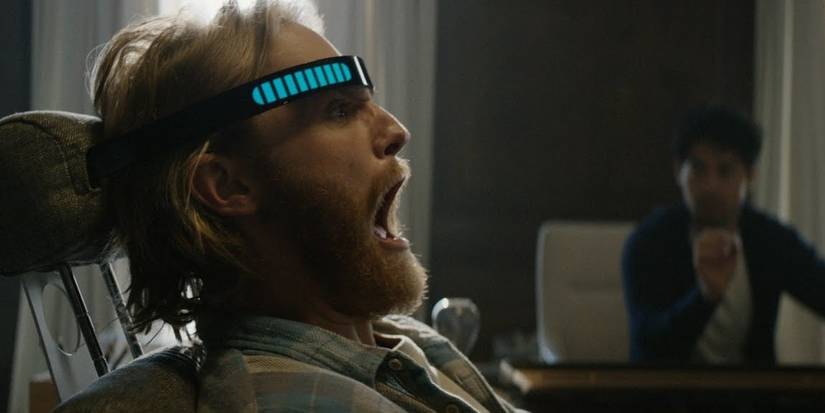 Cooper from Black Mirror's episode Playtest wears a VR headset and screams