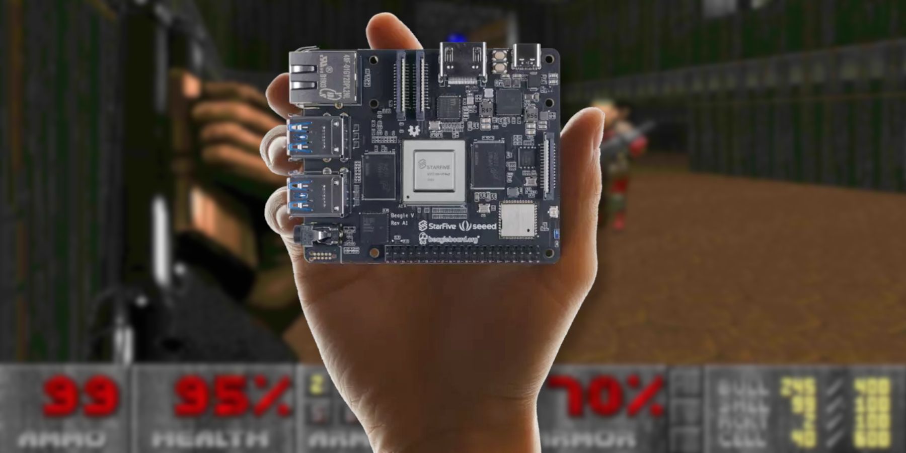 A hand holding up a computer chip board with Doom playing in the background.