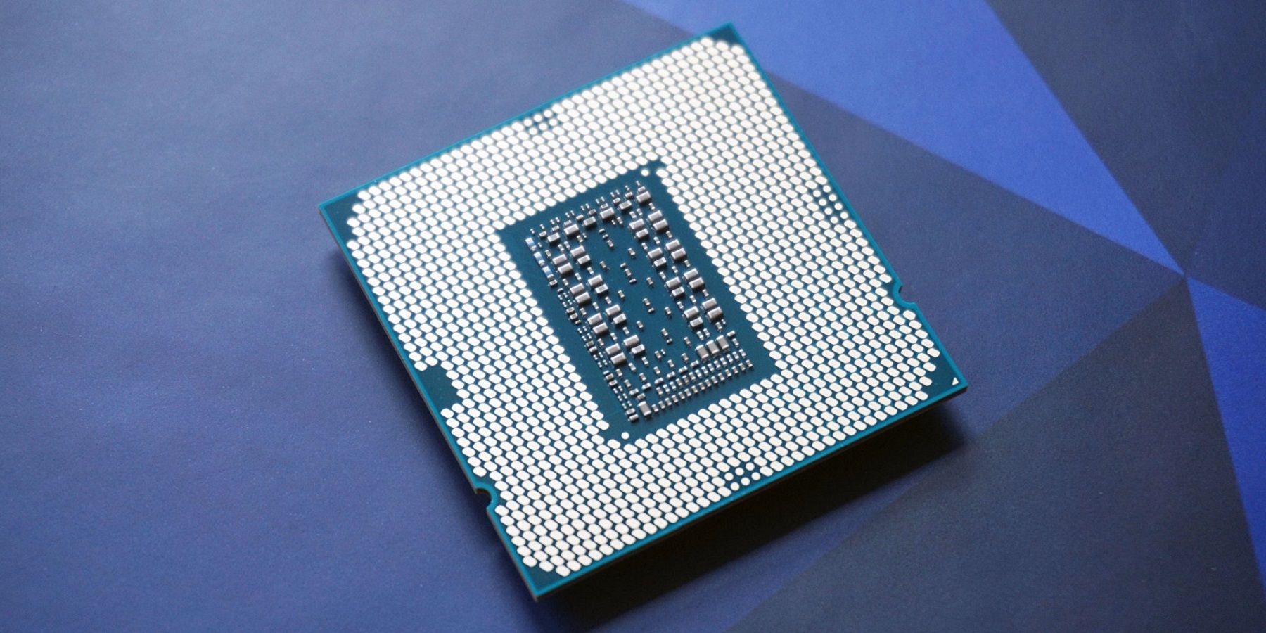 A photograph of an Intel i9 processor chip.