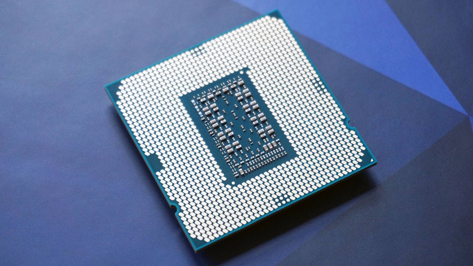 A photograph of an Intel i9 processor chip.