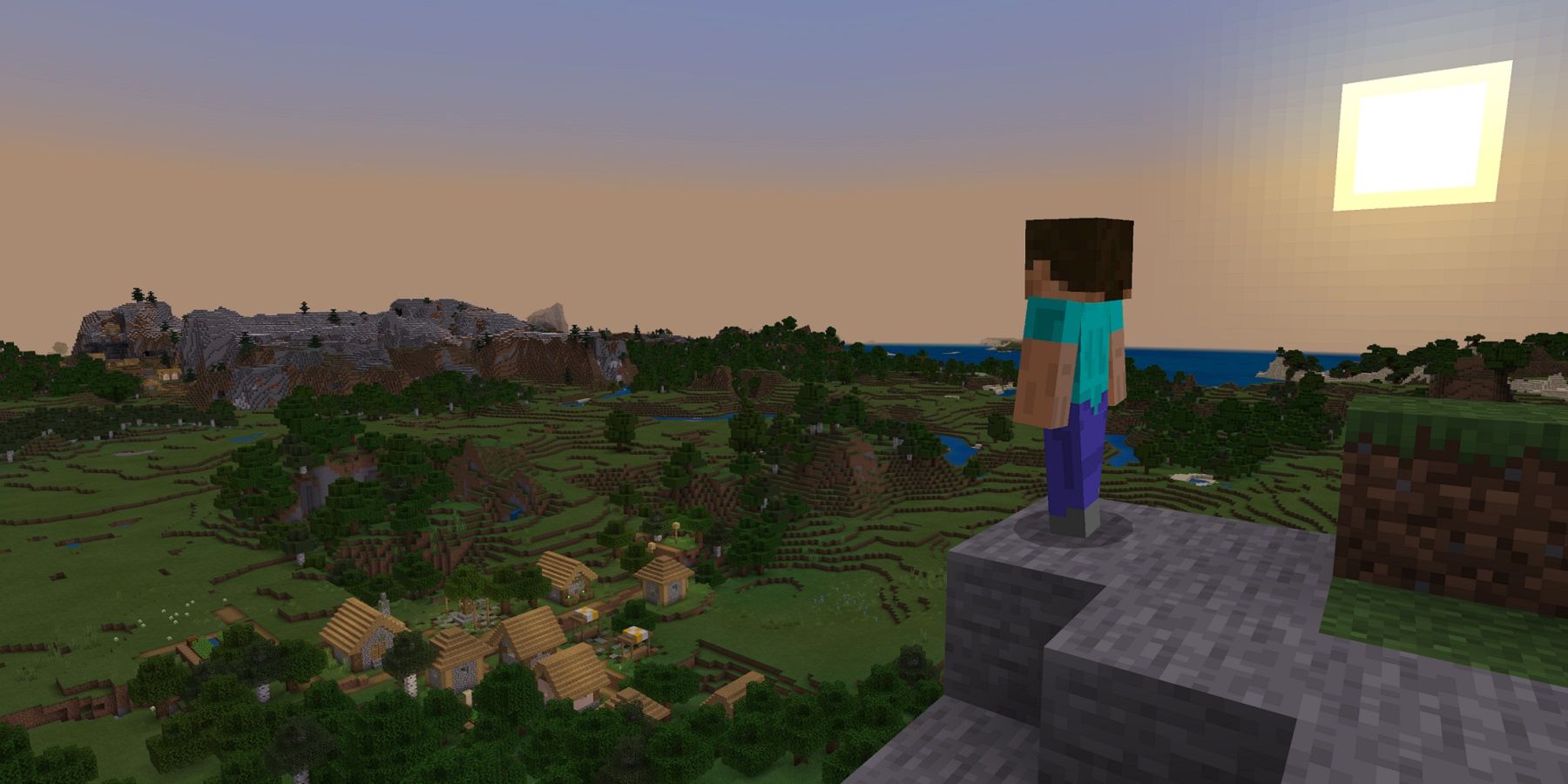 Screenshot from Minecraft showing Minecraft Steve on top of a hill looking out into the distance as the sun sets.