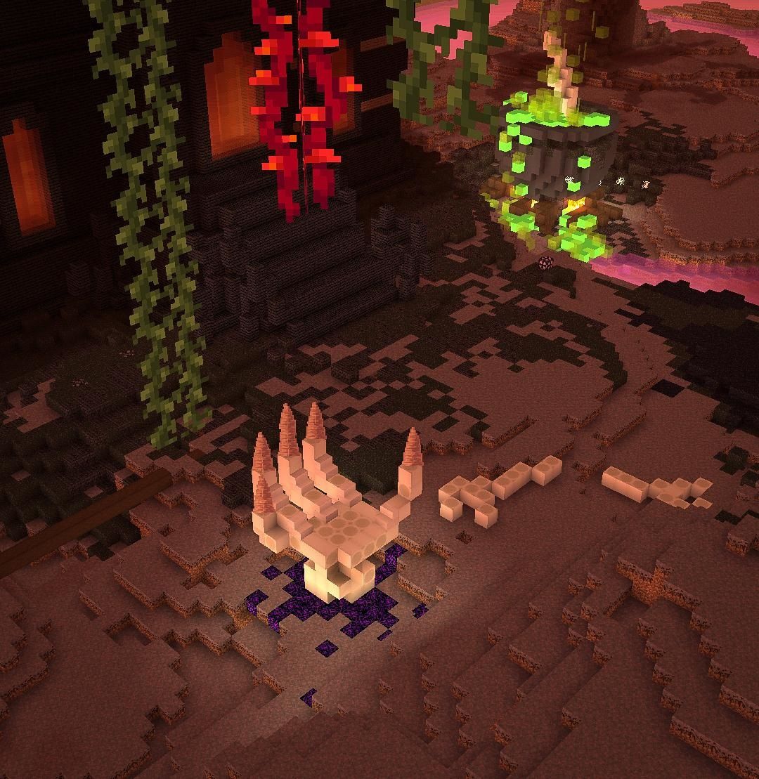 Screenshot from Minecraft showing a giant hand built in the nether.