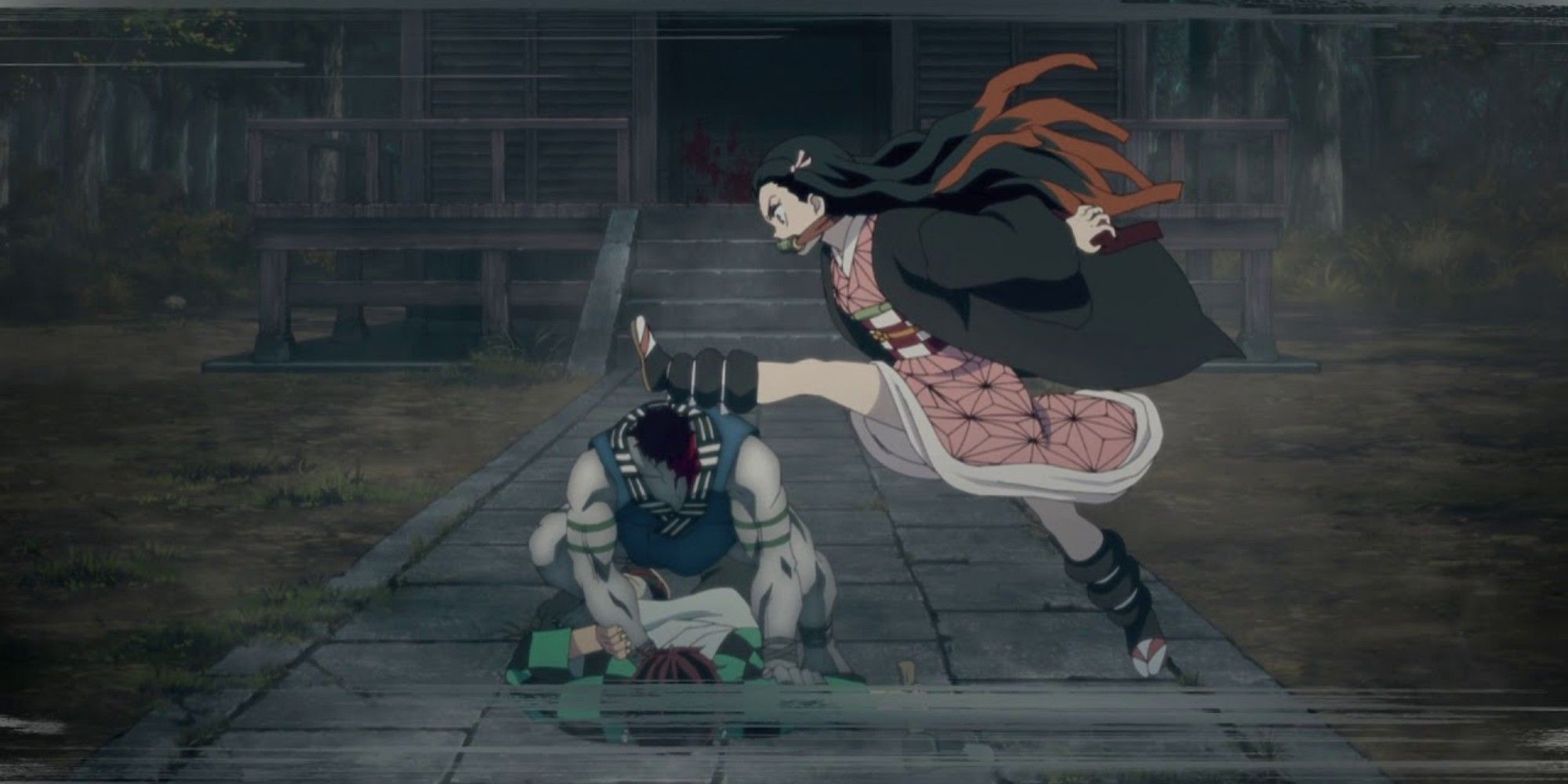 nezuko kicks head off in demon slayer