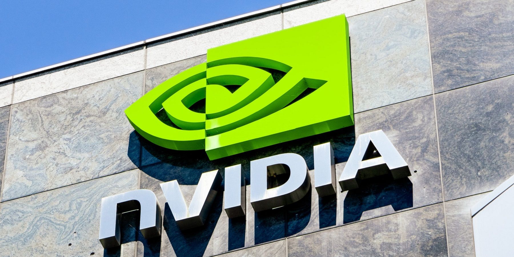 Image of the Nvidia logo on a building, presumably the company headquarters.