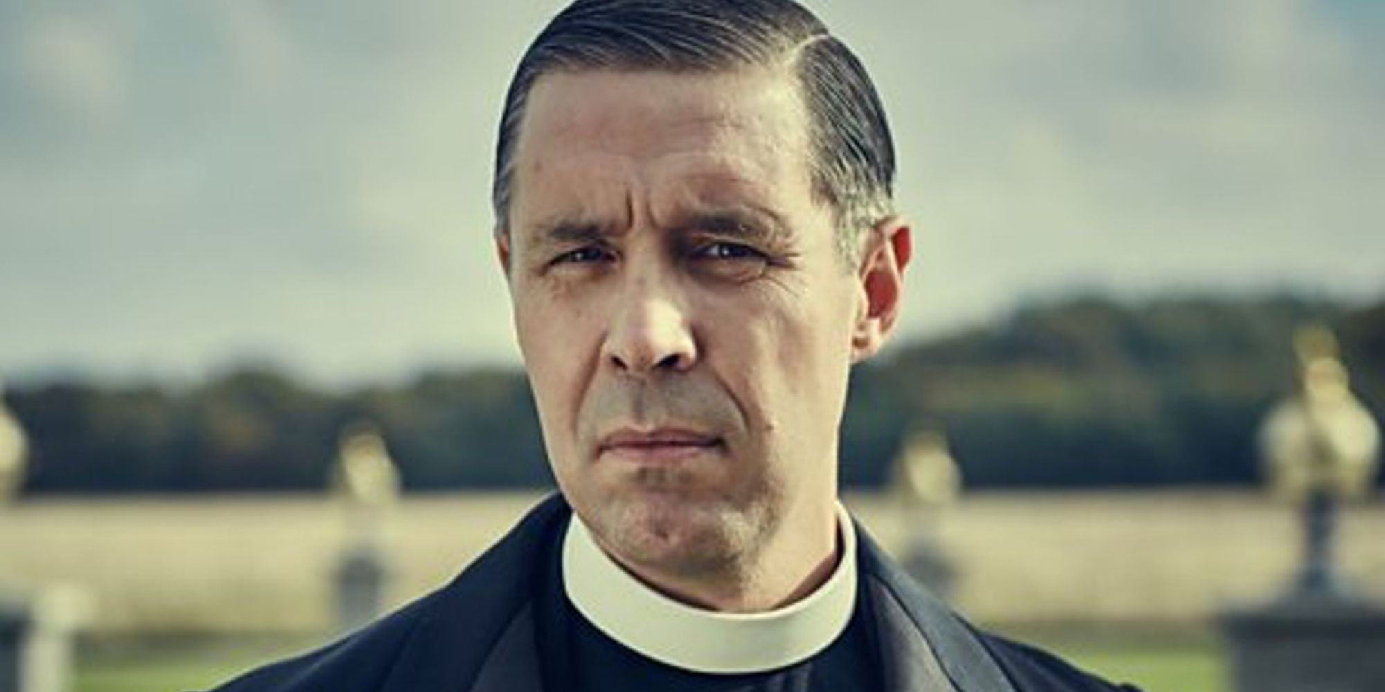 An image of Father Hughes from TV show Peaky Blinders.