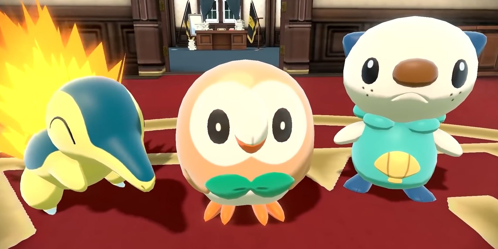 Cyndaquil, Rowlett, and Oshawott stand in a drawing room