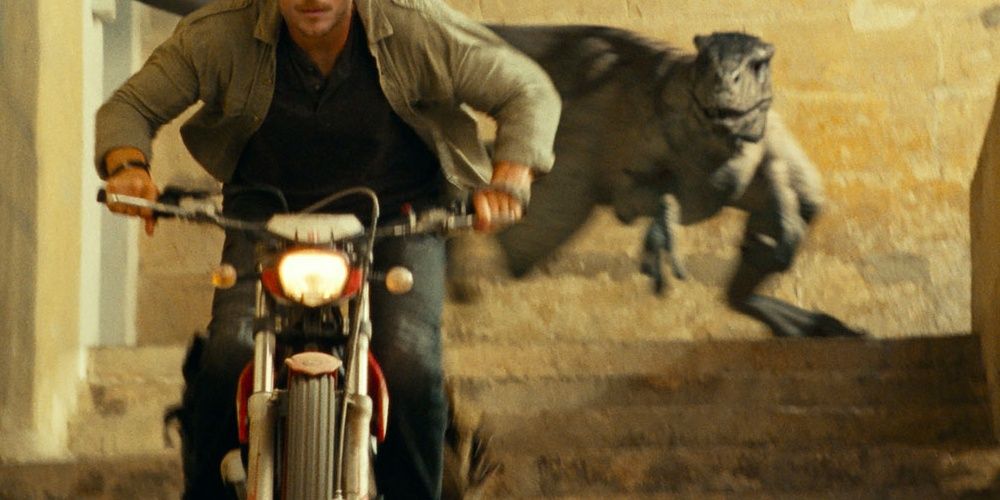 An Atrociraptor chasing Owen in Jurassic World: Dominion.