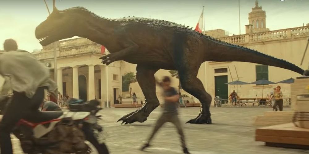 A  Carnotaurus rampaging a Maltese city in Jurassic World: Dominion.