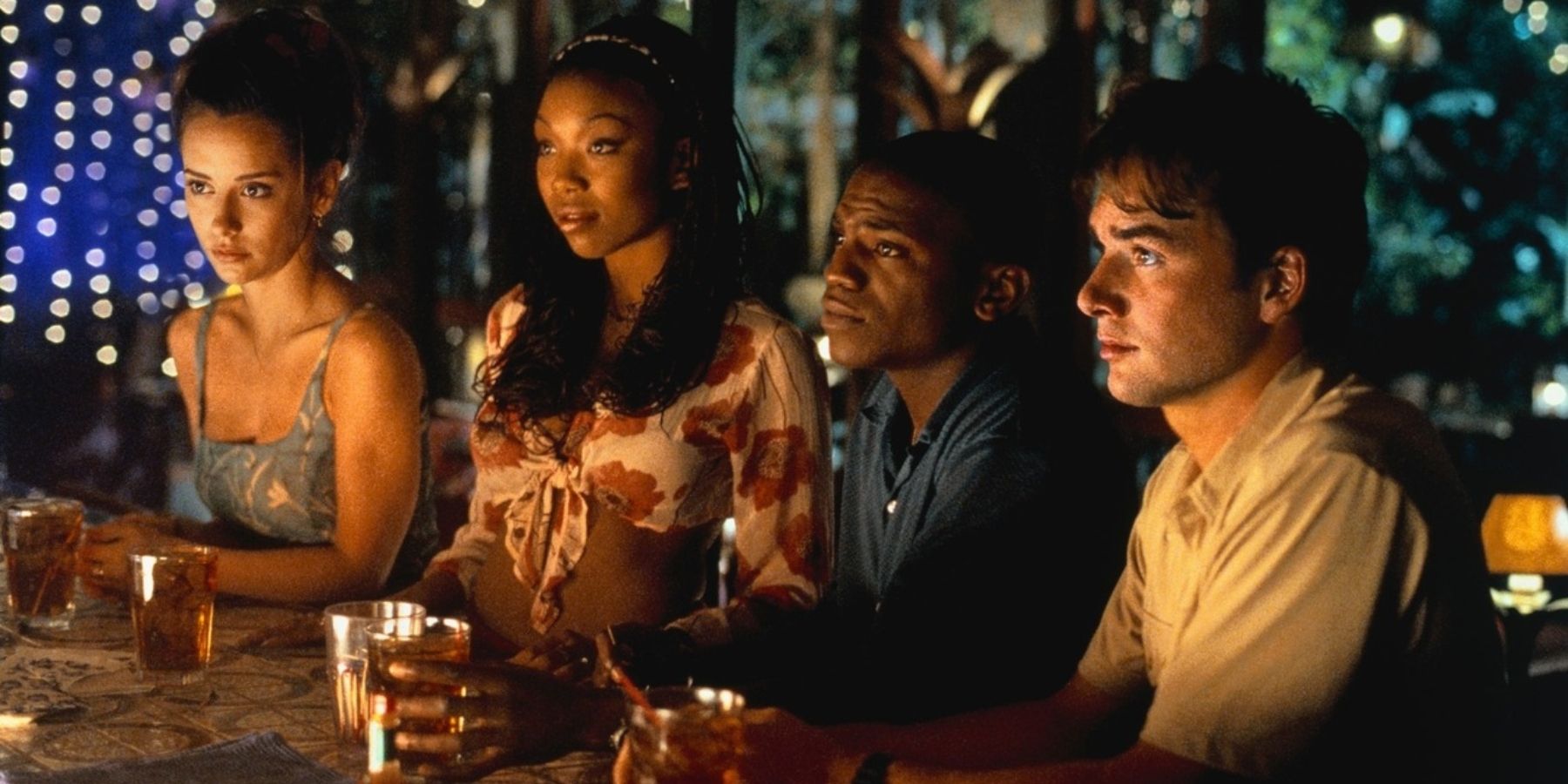 Julie, Karla, Tyrell, and Will sitting at a bar in I Still Know What You Did Last Summer