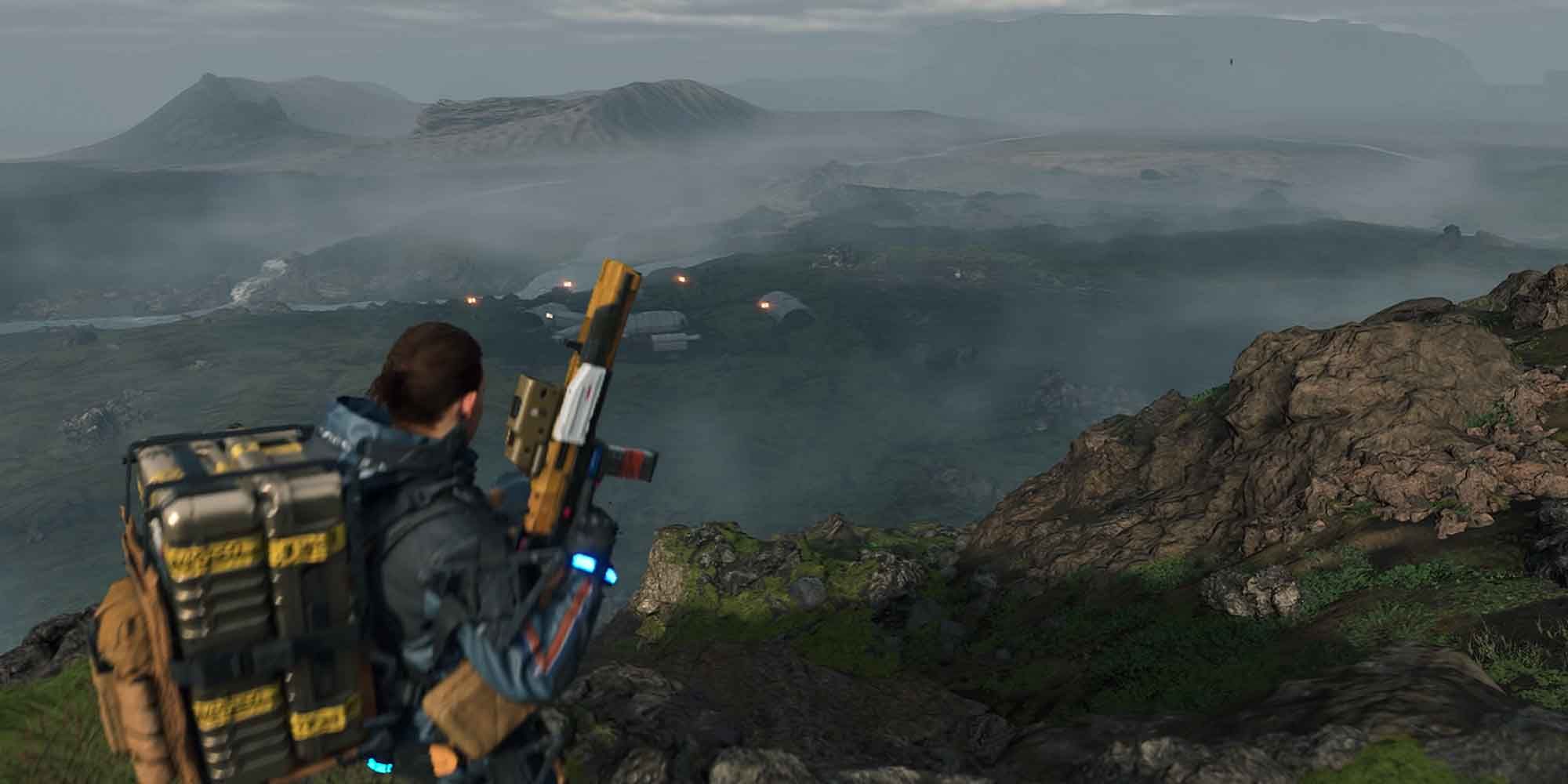 Looking at a settlement in the distance in Death Stranding