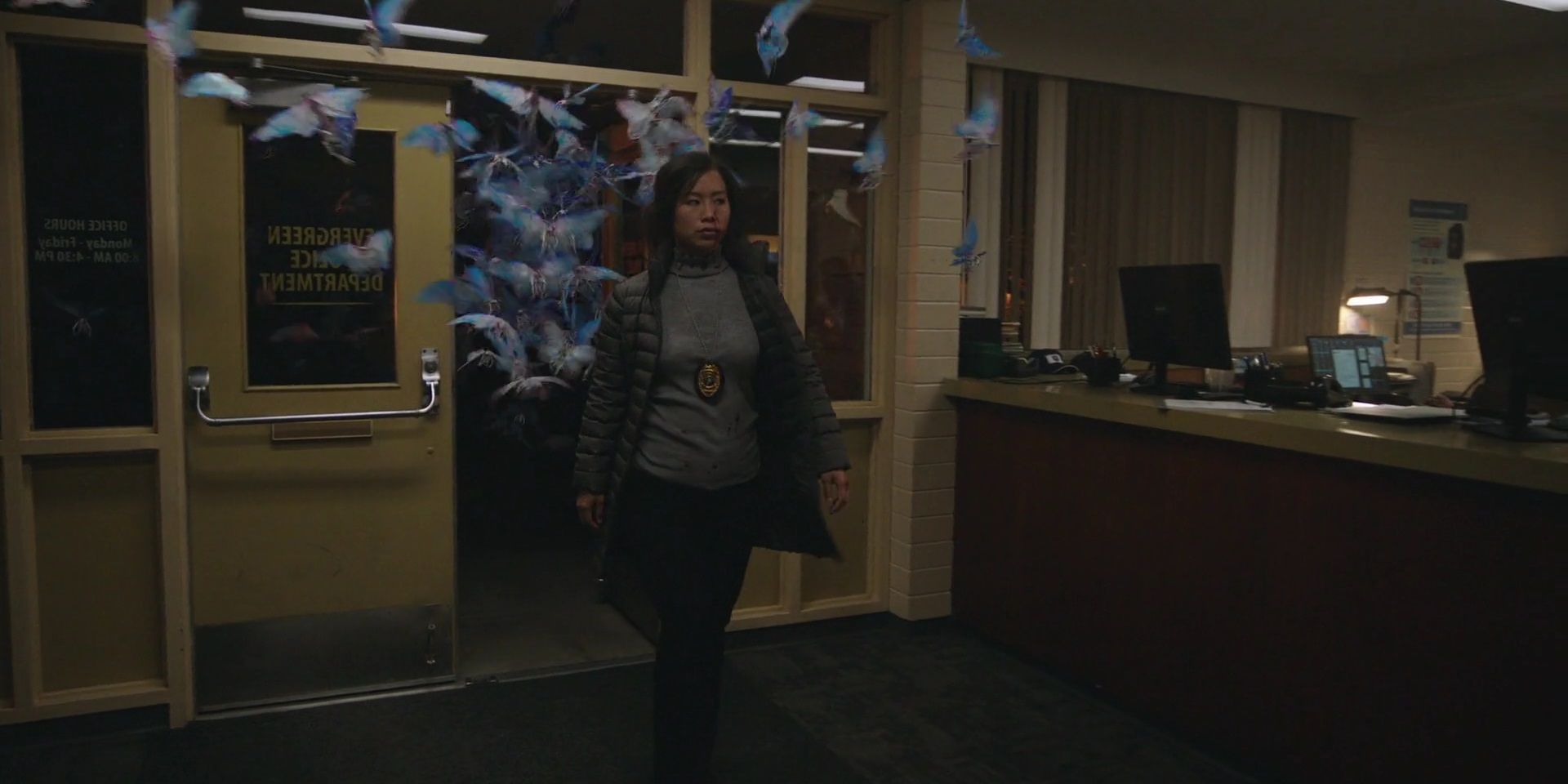 Detective Song enters the police station with Butterflies in Peacemaker