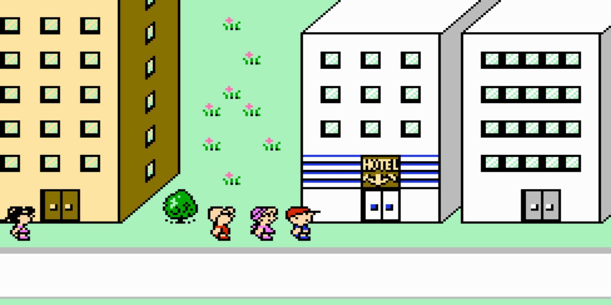 Earthbound Beginnings - Walking down a street next to a hotel.