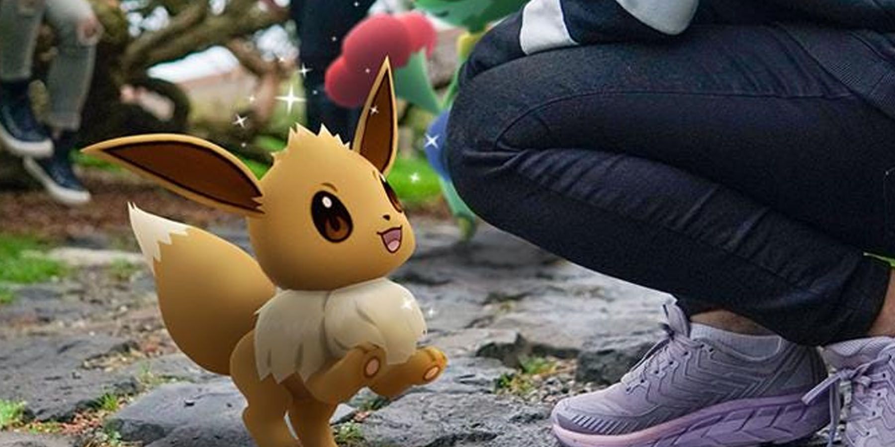 Eevee giving its player a Berry in Pokemon GO