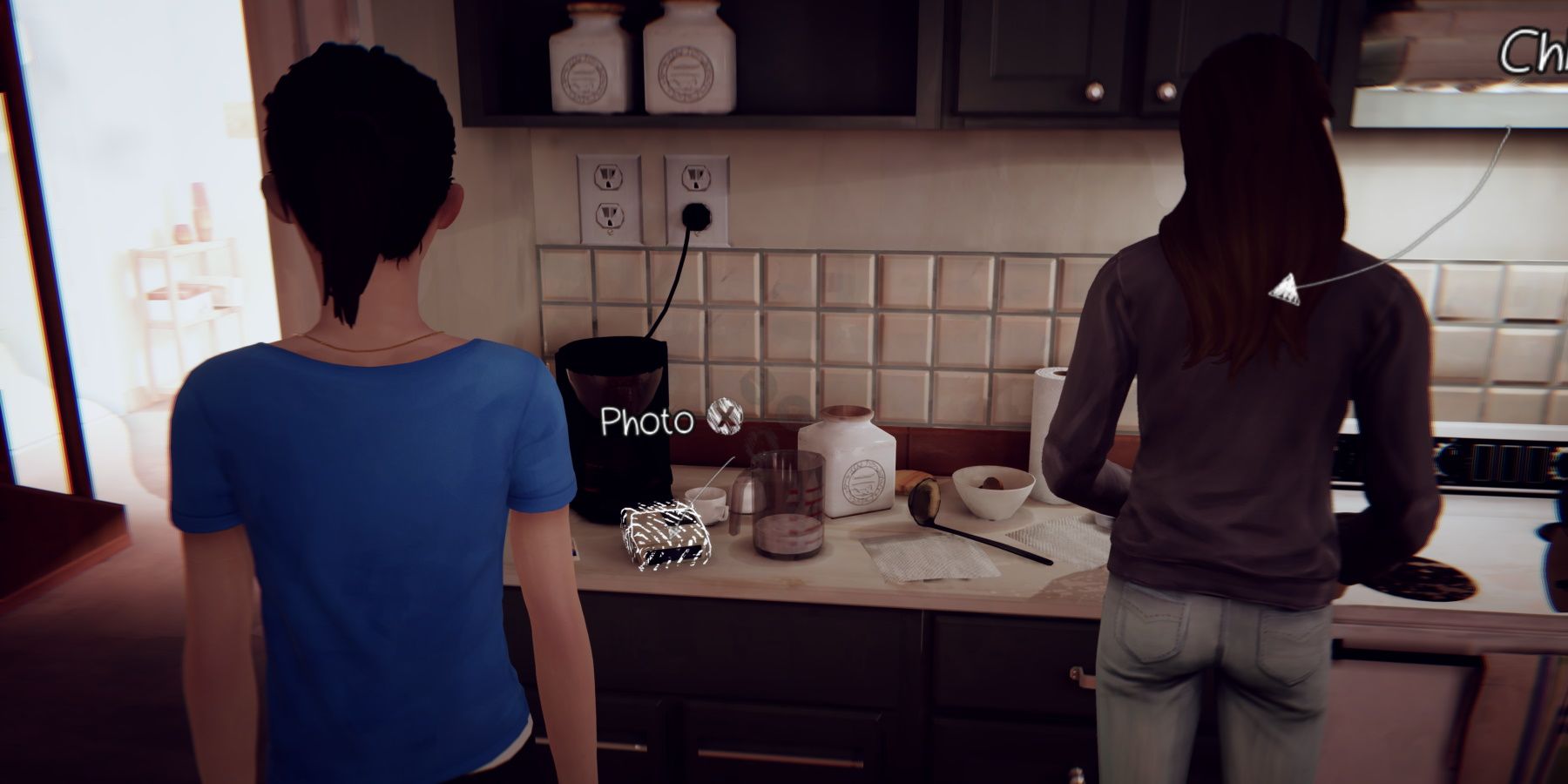 Young Max looking at a camera during a flashback at Chloe's house, during Episode 3 of Life is Strange Remastered