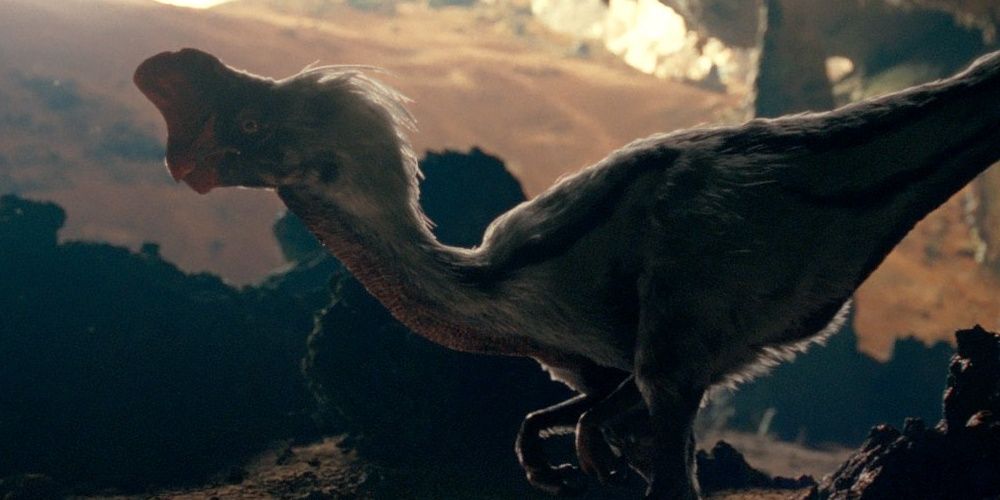 An Oviraptor getting ready to eat some eggs in Jurassic World: Dominion.
