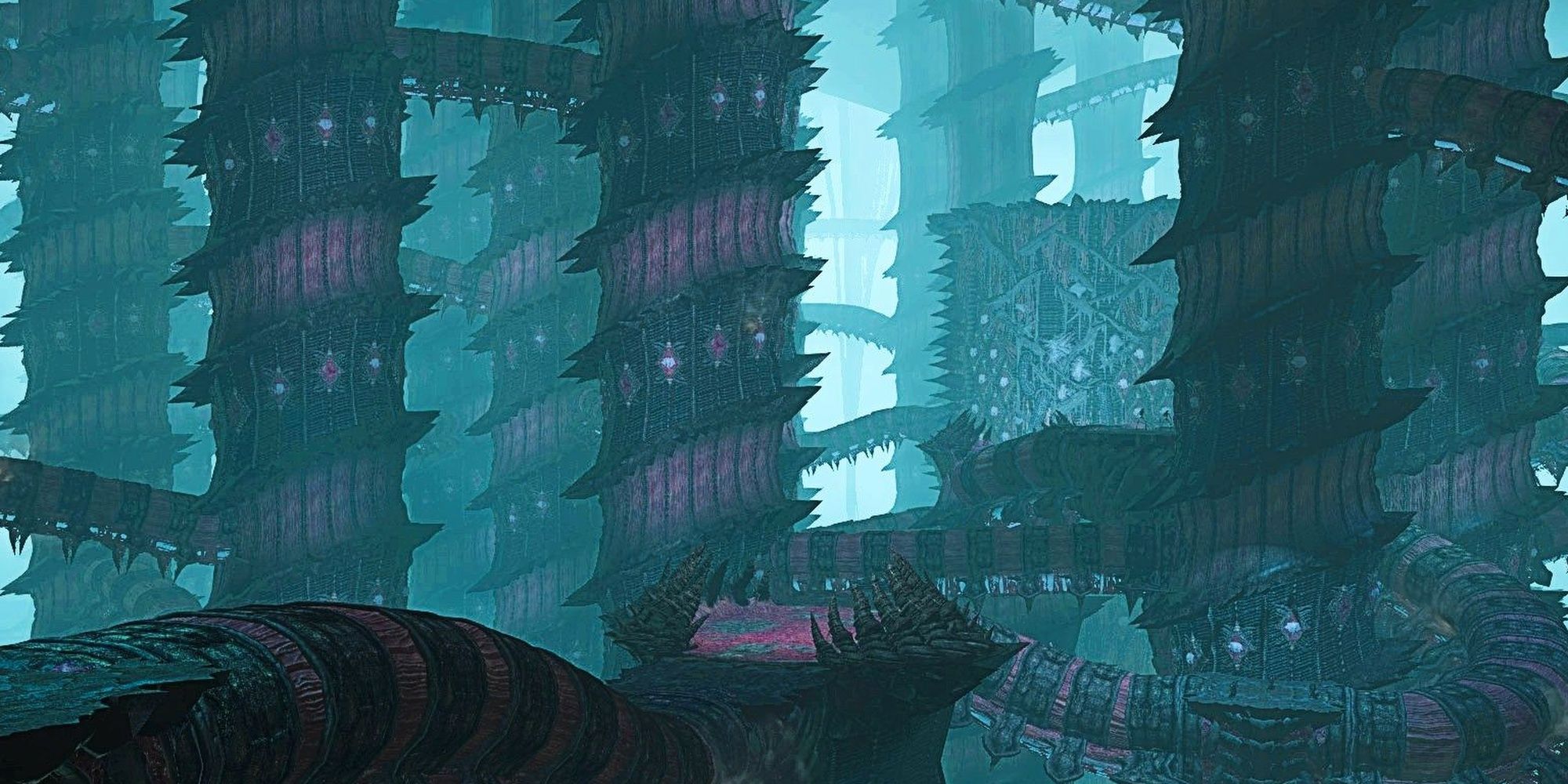 The Tower of Zot dungeon from Final Fantasy 14: Endwalker. Numerous spiralling red pillars ascend upwards. 