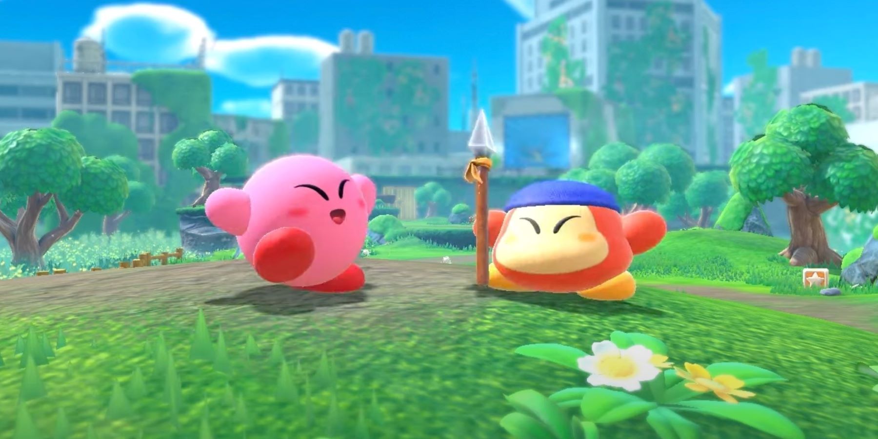 Кирби и Бандана Уоддл Ди весело выглядят вместе в Kirby and the Forgotten Land