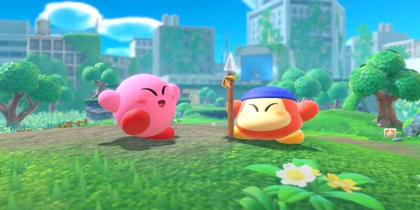 Kirby and Bandana Waddle Dee looking cheerful together in Kirby and the Forgotten Land