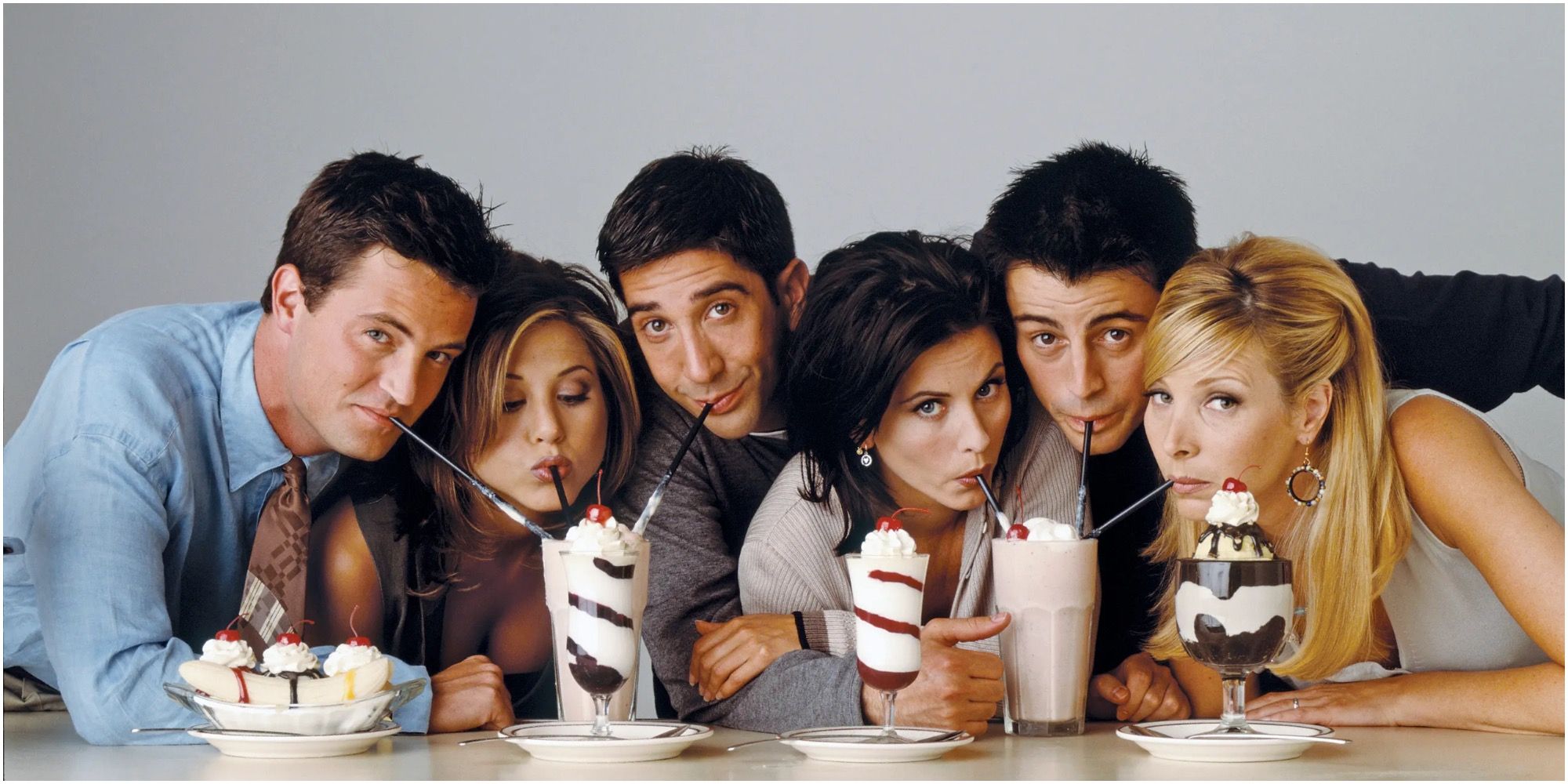 Friends Sitcom Picture Of The Cast Members Matt Leblanc Matthew Perry Jennifer Aniston Courteney Cox Lisa Kudrow and David schwimmer Drinking Milkshakes And Eating Ice Cream