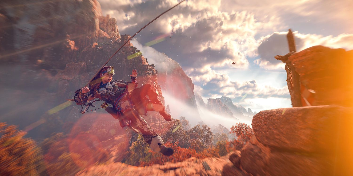 aloy using the pullcaster rope tool to fly through the air with mountains behind her