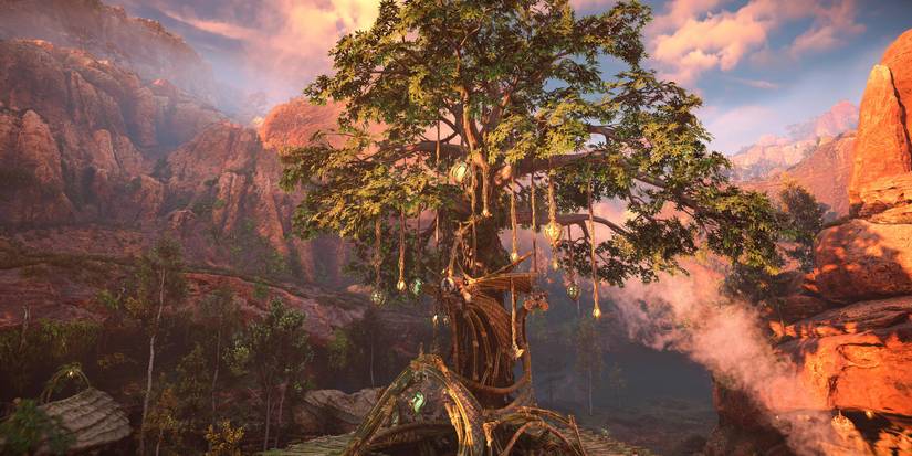 a large, green tree with various crystalline lanterns hanging from its branches 