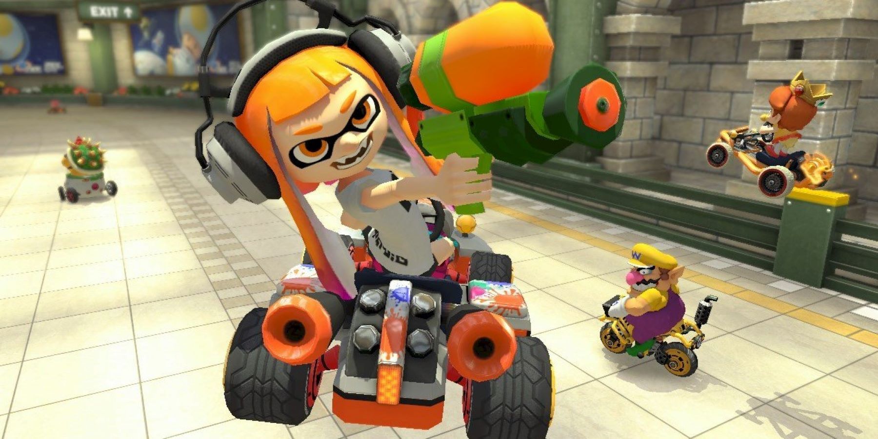 Inkling taunting with an ink blaster in Mario Kart 8 Deluxe