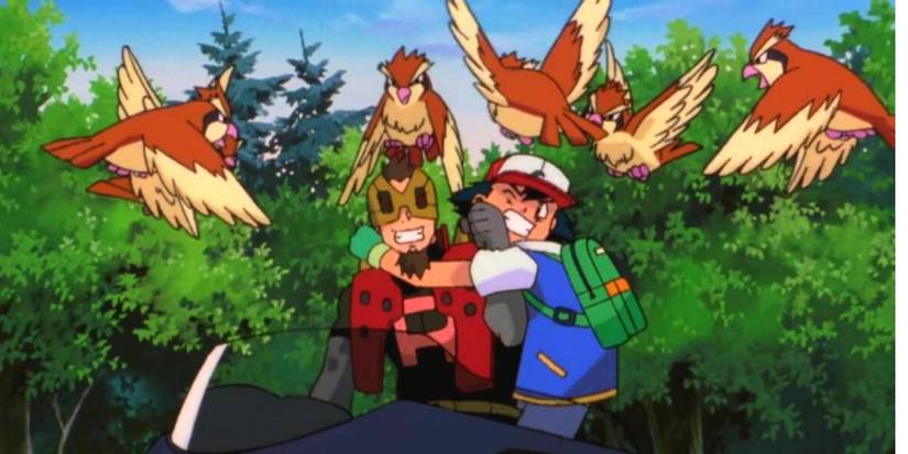 Pokemon: Team Rocket's Iron Masked Marauder Fights Ash While Being Attacked By A Flock Of Wild Pidgeys