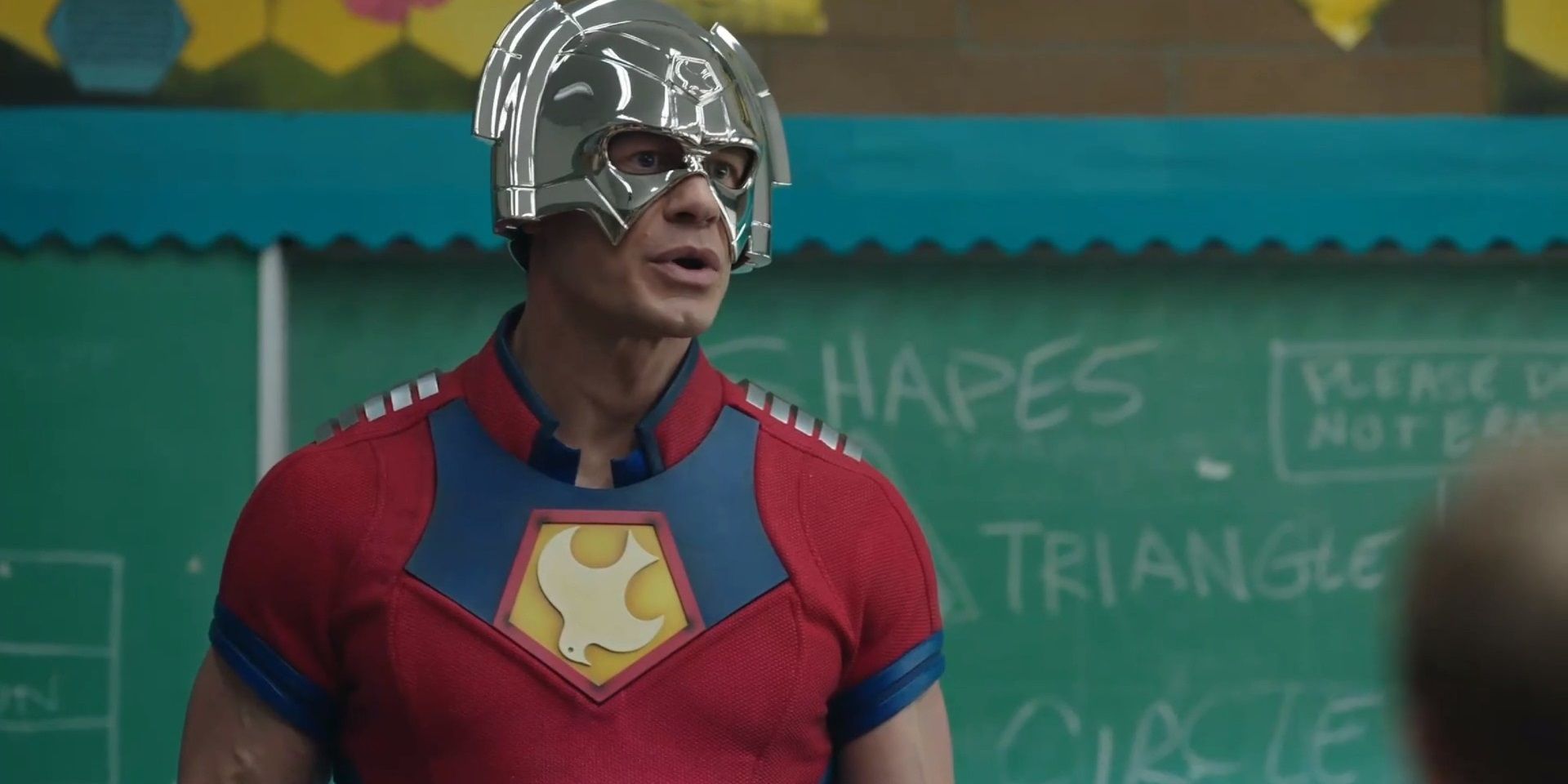 John Cena as Peacemaker talking to a class full of schoolchildren