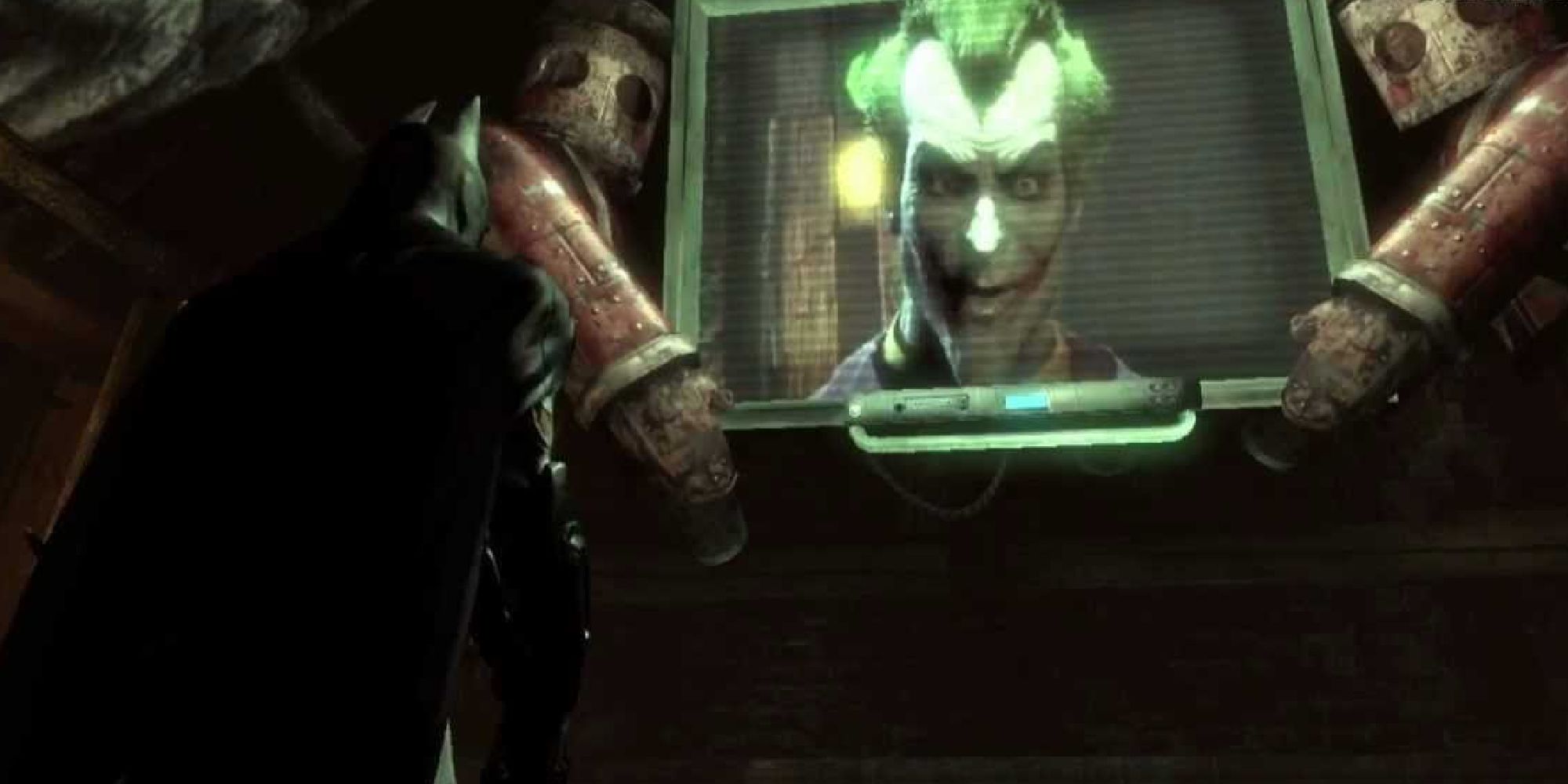 Джокер появляется на экране телевизора и разговаривает с Бэтменом.