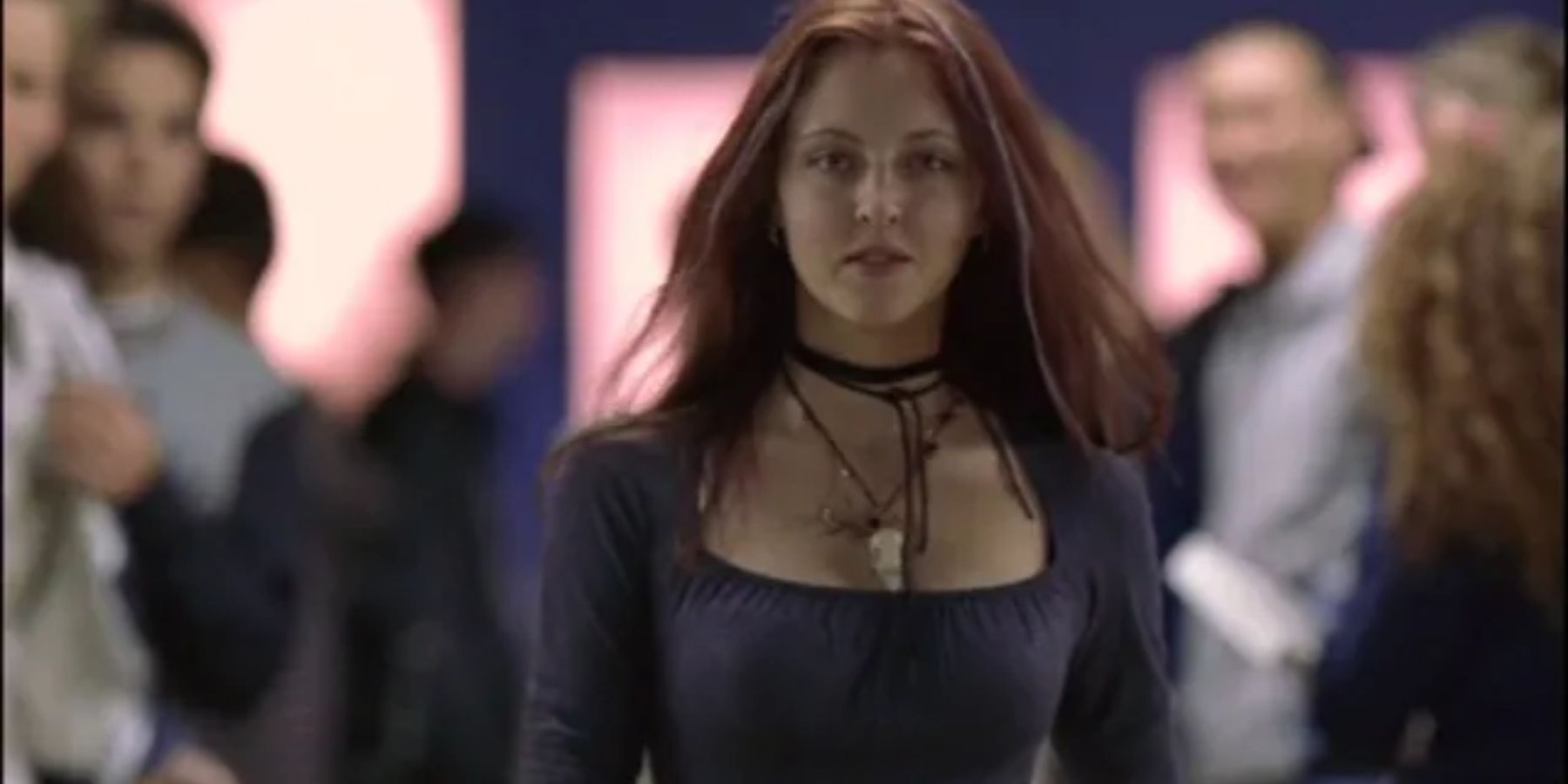 Katharine Isabelle walking in the high school in Ginger Snaps