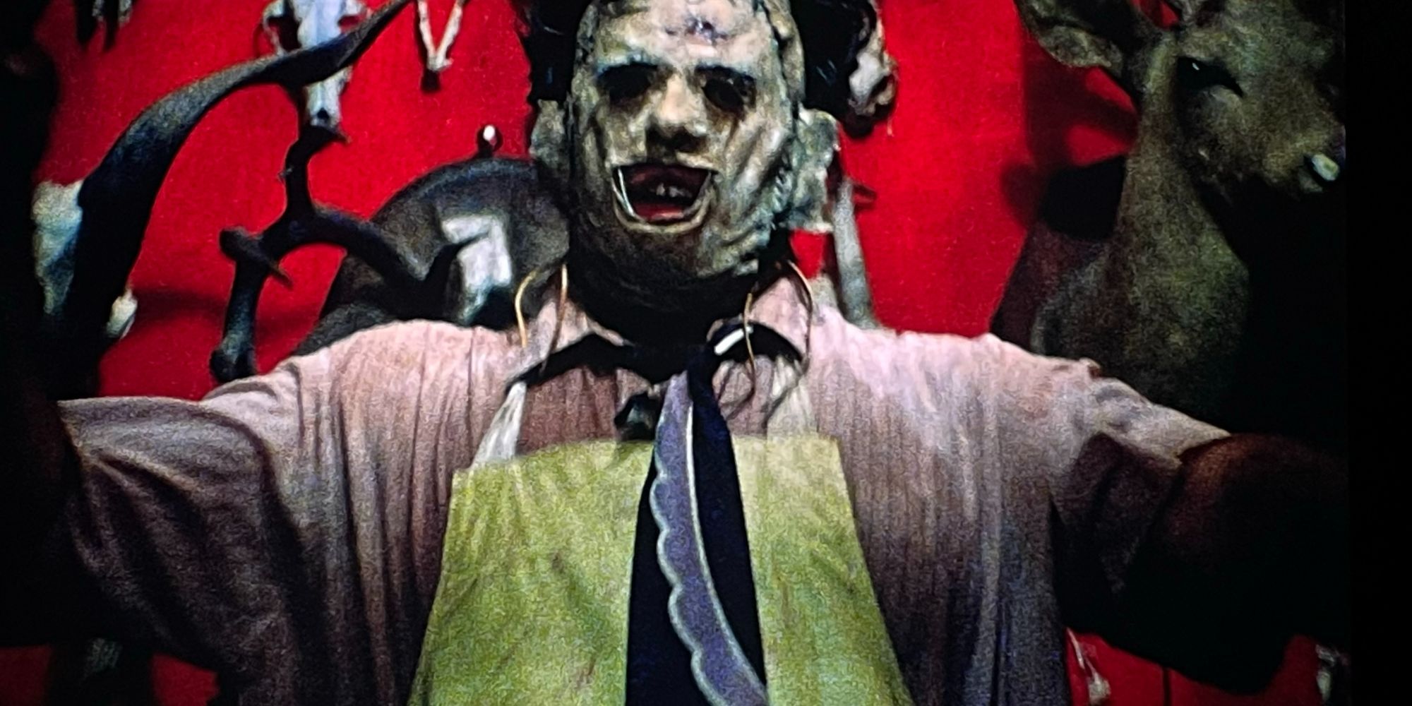 Leatherface stands in the doorway after killing Kirk in the Texas Chain Saw Massacre 1974