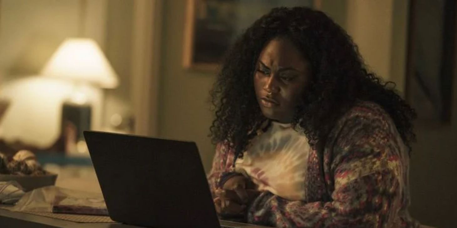 Leota Adebayo looks at her computer in Peacemaker Episode 6