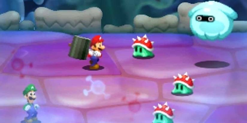 Mario and Luigi battling enemies inside Bowser's body