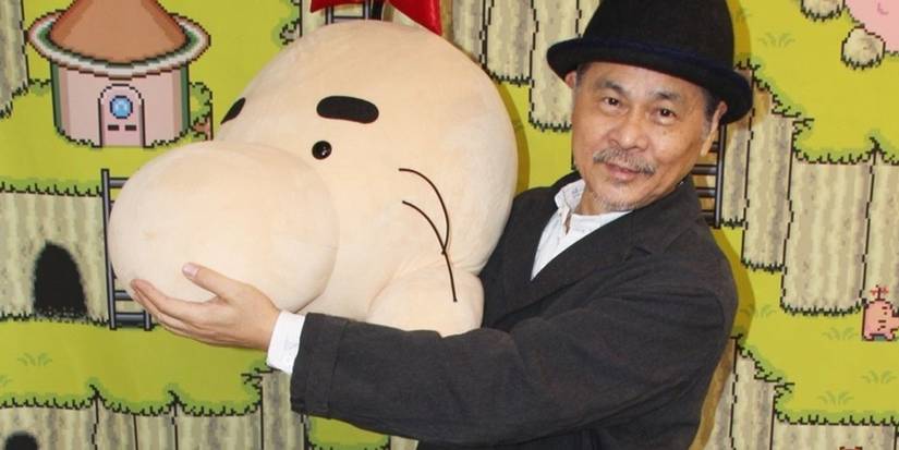 Mother 3 Shigesato Itoi holding a Mr. Saturn